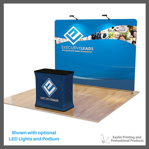 KYN-TSD-001 Tradeshow Display with 10 foot straight shape and vibrant graphics printed on fabric. Personalized with your custom imprint or logo. Shown with optional LED Lights and Podium.